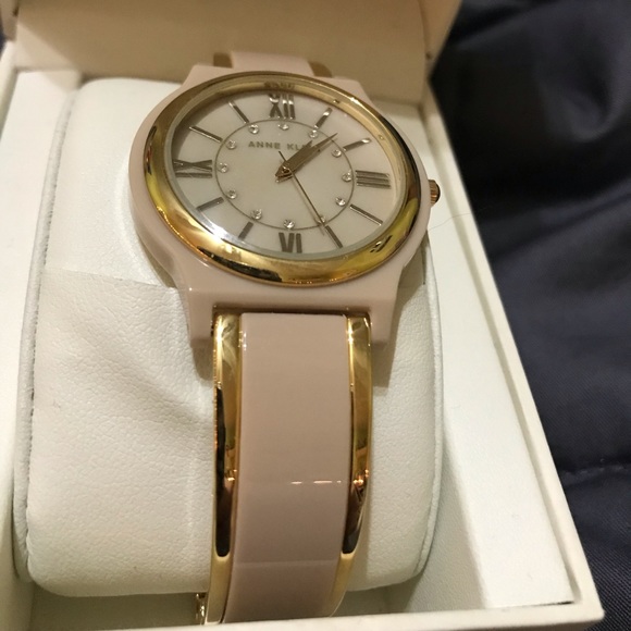 Anne Klein Accessories - Cute Anne Klein pale pink and gold watch.